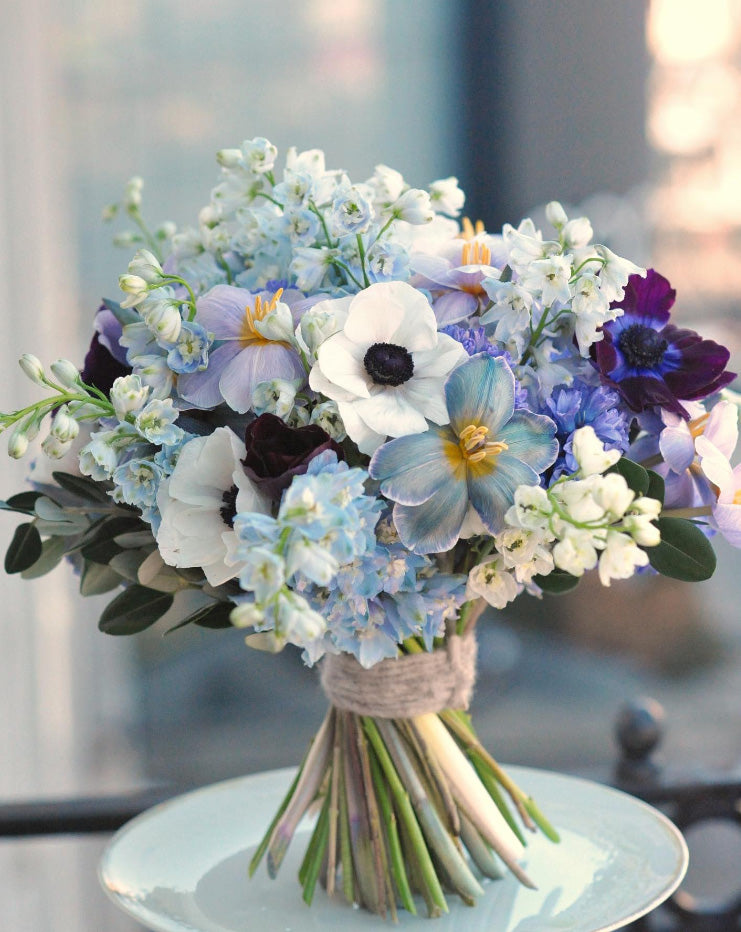 White Anemone & Powder Blue Delphinium Bridal Bouquet