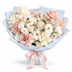 Soft-Spoken Romance, white and blush roses, tulips, lisianthus and carnations in blue wrapping