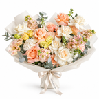 Garden in Blush, white and peach roses, peach lisianthus and white stock in off-white wrapping