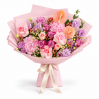 Blush After Dark, deep-purple and pink roses, pink hydrangea, anthuriums and purple lisianthus in light pink wrapping