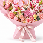 Blush Spectacle, pink orchids, pink and white lilies, blush roses, hydrangea and carnations, packaging detail