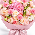 Coral Spark, cream and coral roses, pink hydrangea, carnations and cream lisianthus, floral detail