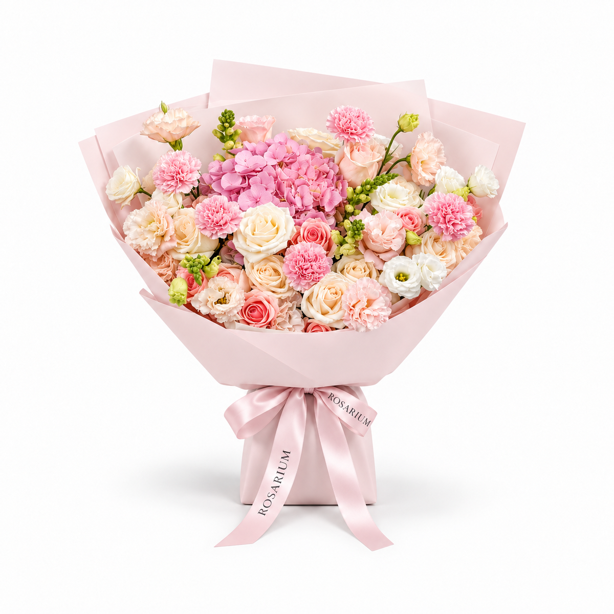 Coral Spark, cream and coral roses, pink hydrangea, carnations and cream lisianthus in light pink wrapping