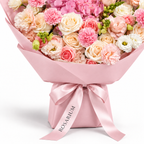 Coral Spark, cream and coral roses, pink hydrangea, carnations and cream lisianthus, packaging detail
