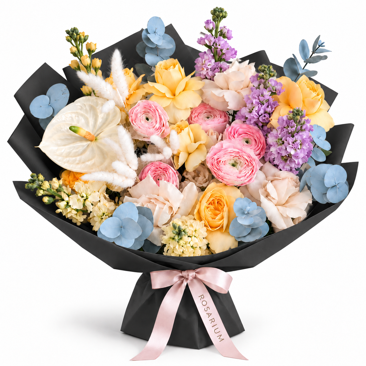 Colour Daydream, yellow roses, pink ranunculus, white anthuriums and lavender stock in black wrapping
