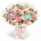 Soft Focus, soft roses and hydrangea in off-white wrapping