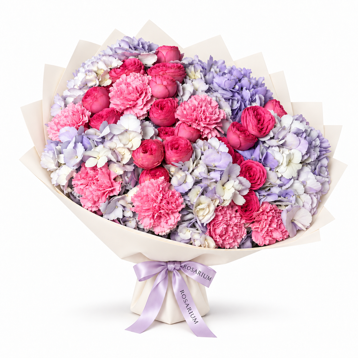 Lavender Hush, lavender hydrangea, blush roses and pink carnations in off-white wrapping
