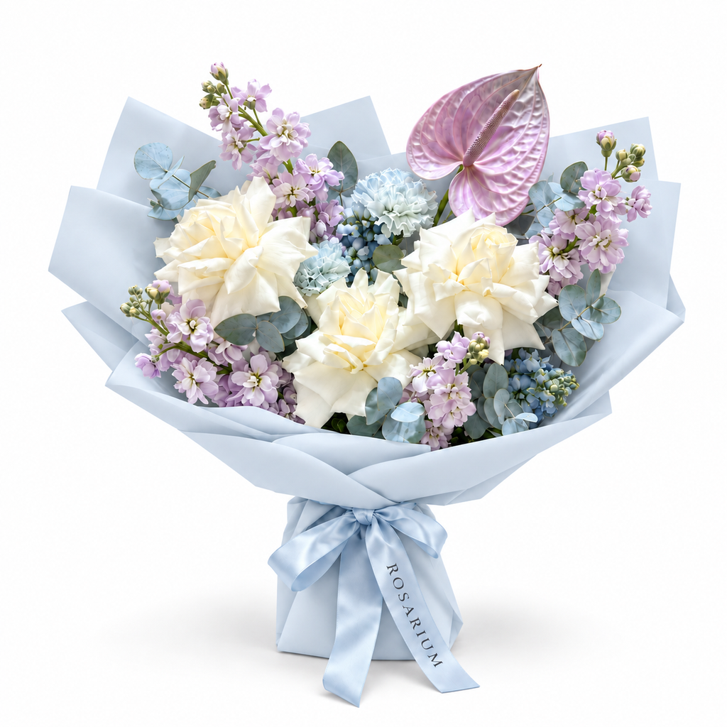 Lilac Orbit, white roses, lilac stock, blue carnations and lilac anthurium in blue wrapping