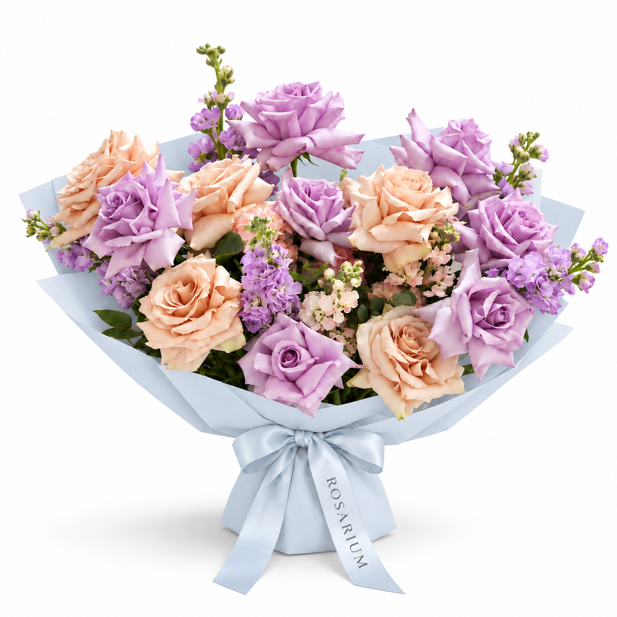 Ocean Hush, soft-purple and taupe roses with seasonal pastel blooms in blue wrapping