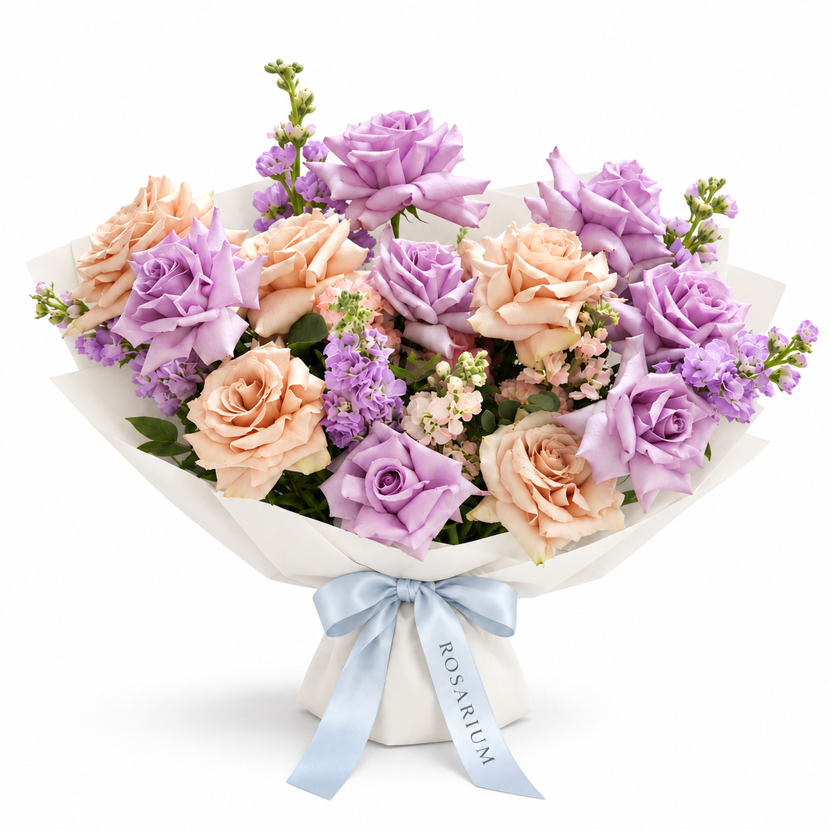 Ocean Hush, soft-purple and taupe roses with seasonal pastel blooms in off-white wrapping