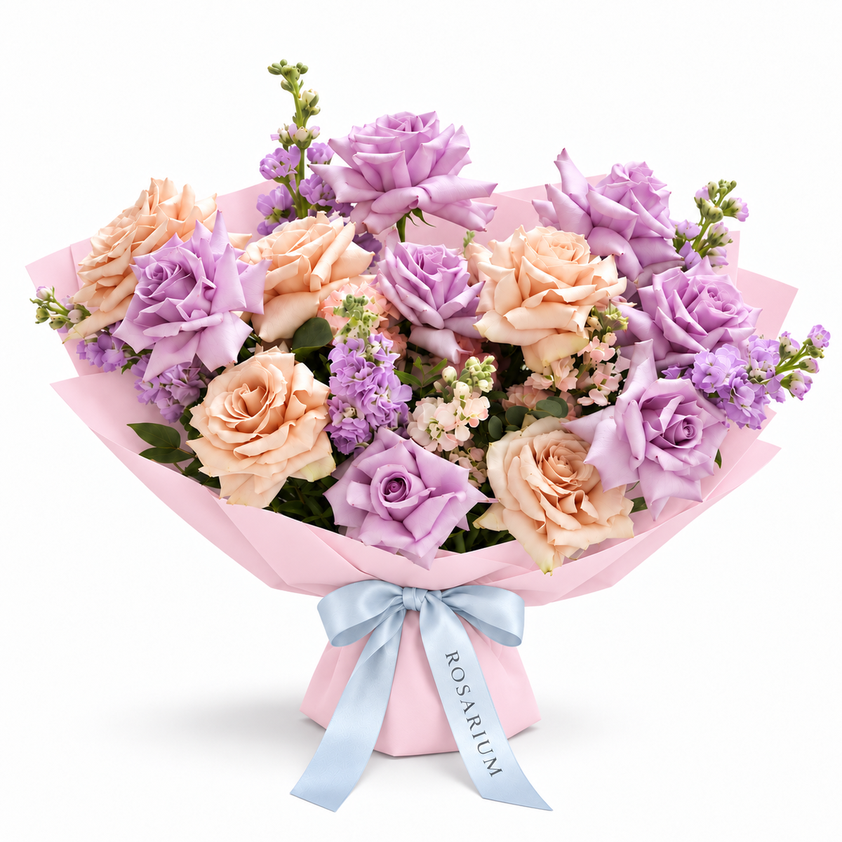 Ocean Hush, soft-purple and taupe roses with seasonal pastel blooms in light pink wrapping