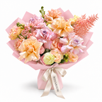Peach Blush Club, pink and peach roses, spray roses, white stock and lisianthus in light pink wrapping