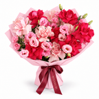 Raspberry Rush, fuchsia and soft-pink roses, lisianthus and hydrangea in light pink wrapping
