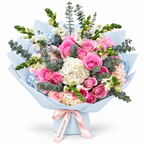 Rosé for No Reason, soft-pink roses and white and pale-blue hydrangea in blue wrapping