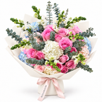 Rosé for No Reason, soft-pink roses and white and pale-blue hydrangea in off-white wrapping