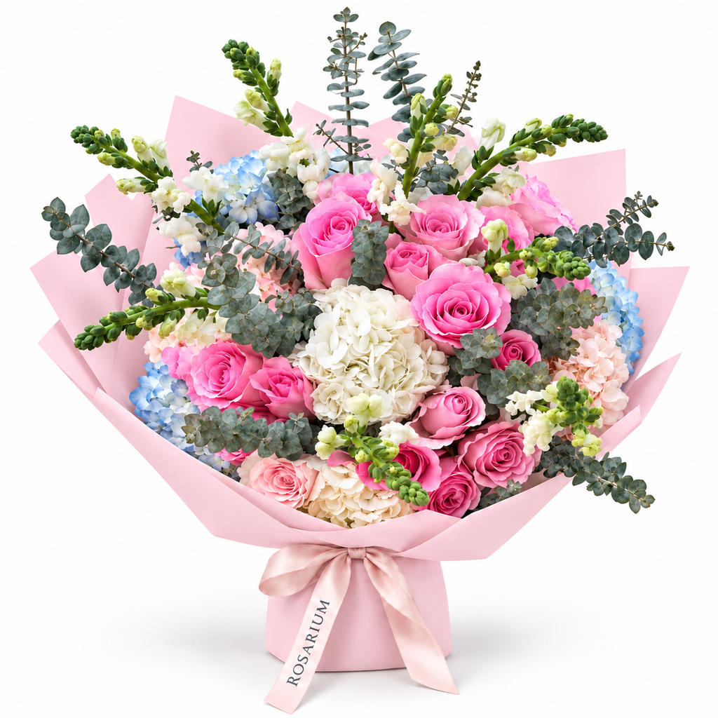 Rosé for No Reason, soft-pink roses and white and pale-blue hydrangea in light pink wrapping