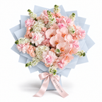 Pink Lemonade Deluxe, light-pink roses, white orchids and white and blush hydrangea in blue wrapping