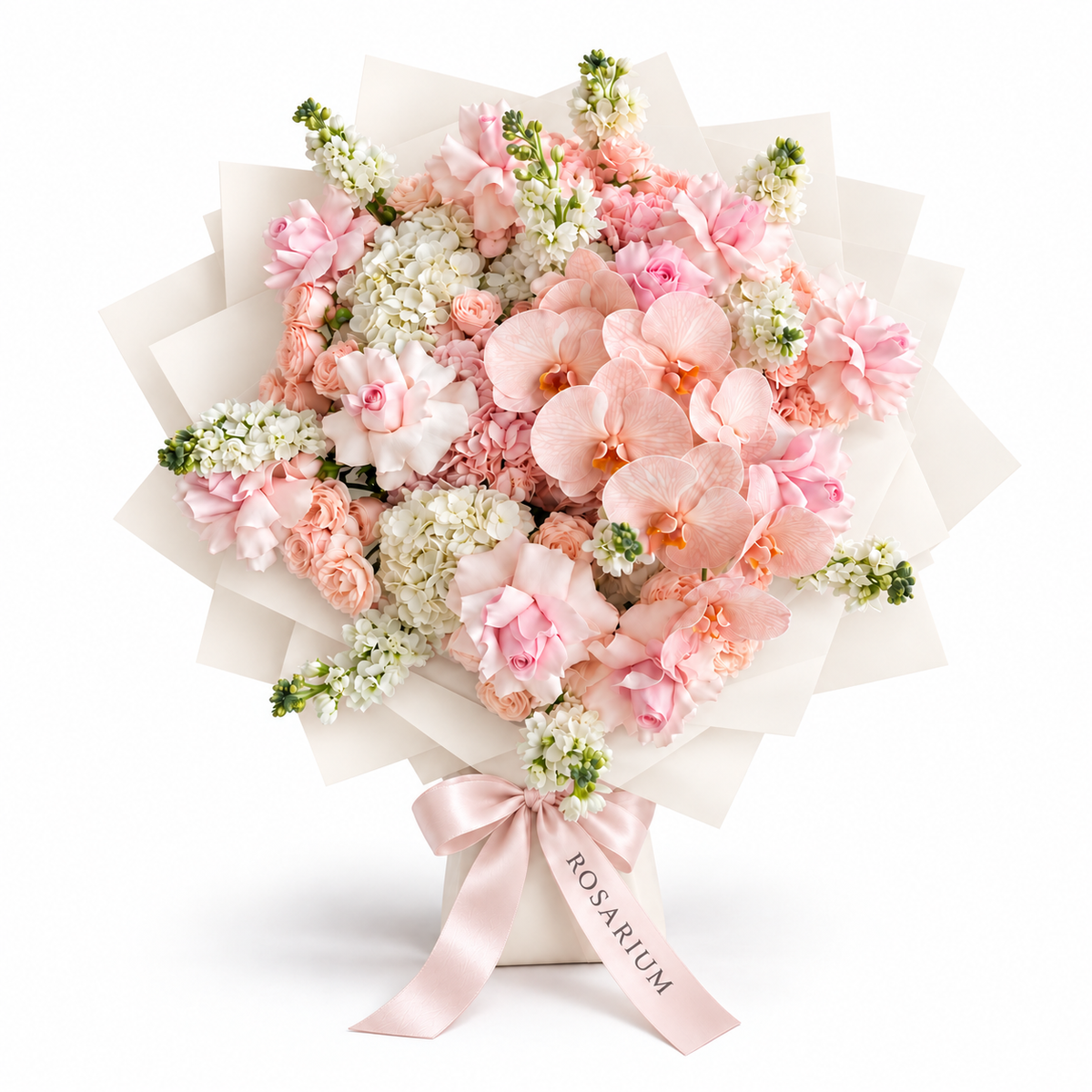Pink Lemonade Deluxe, light-pink roses, white orchids and white and blush hydrangea in off-white wrapping
