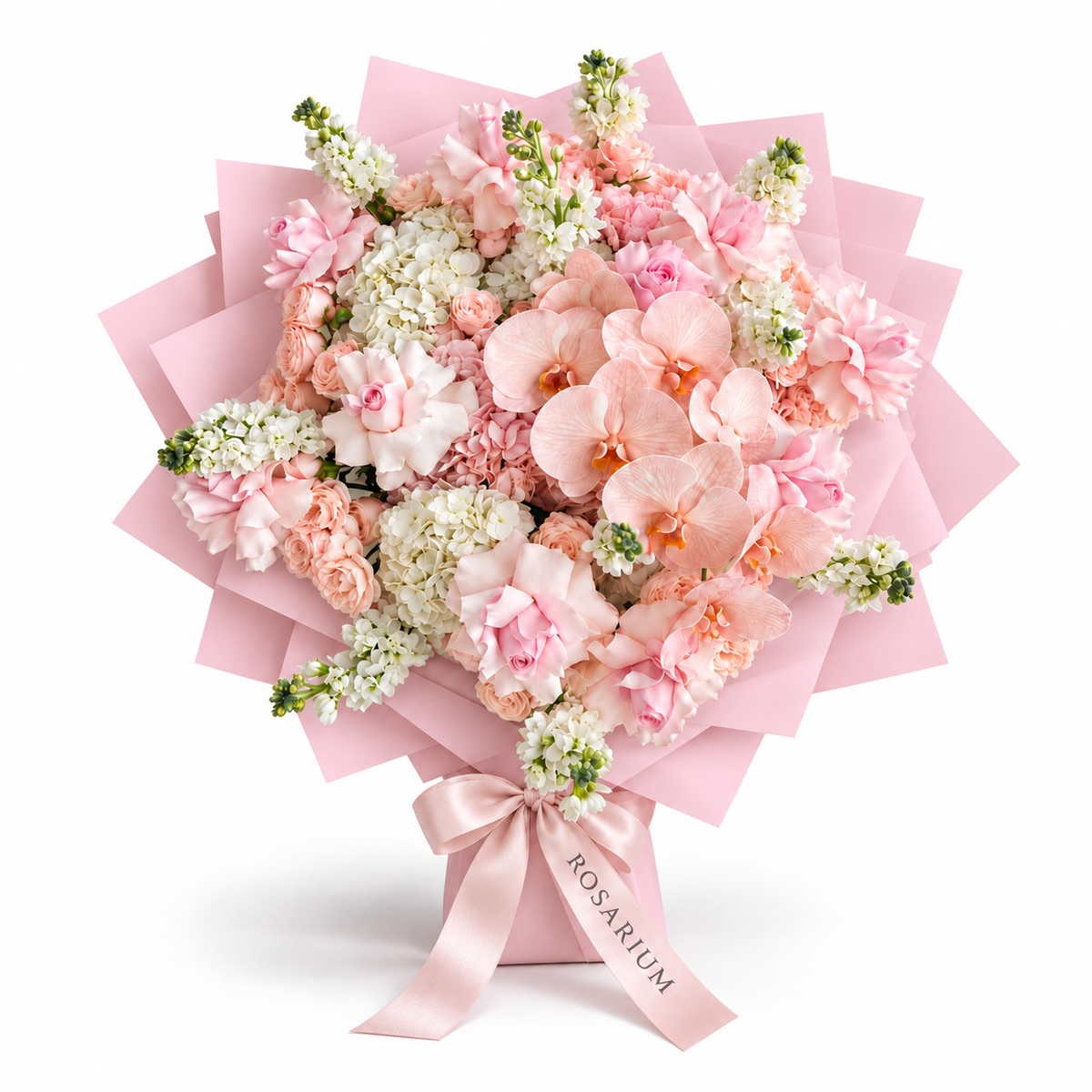 Pink Lemonade Deluxe, light-pink roses, white orchids and white and blush hydrangea in light pink wrapping