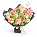 Spring Fling, peach, pink and white roses with small white blooms in black wrapping