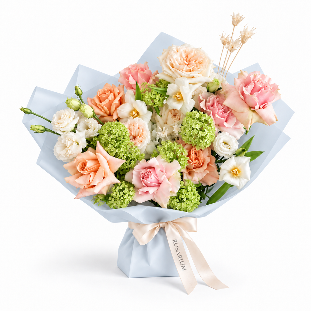 Spring Fling, peach, pink and white roses with small white blooms in blue wrapping