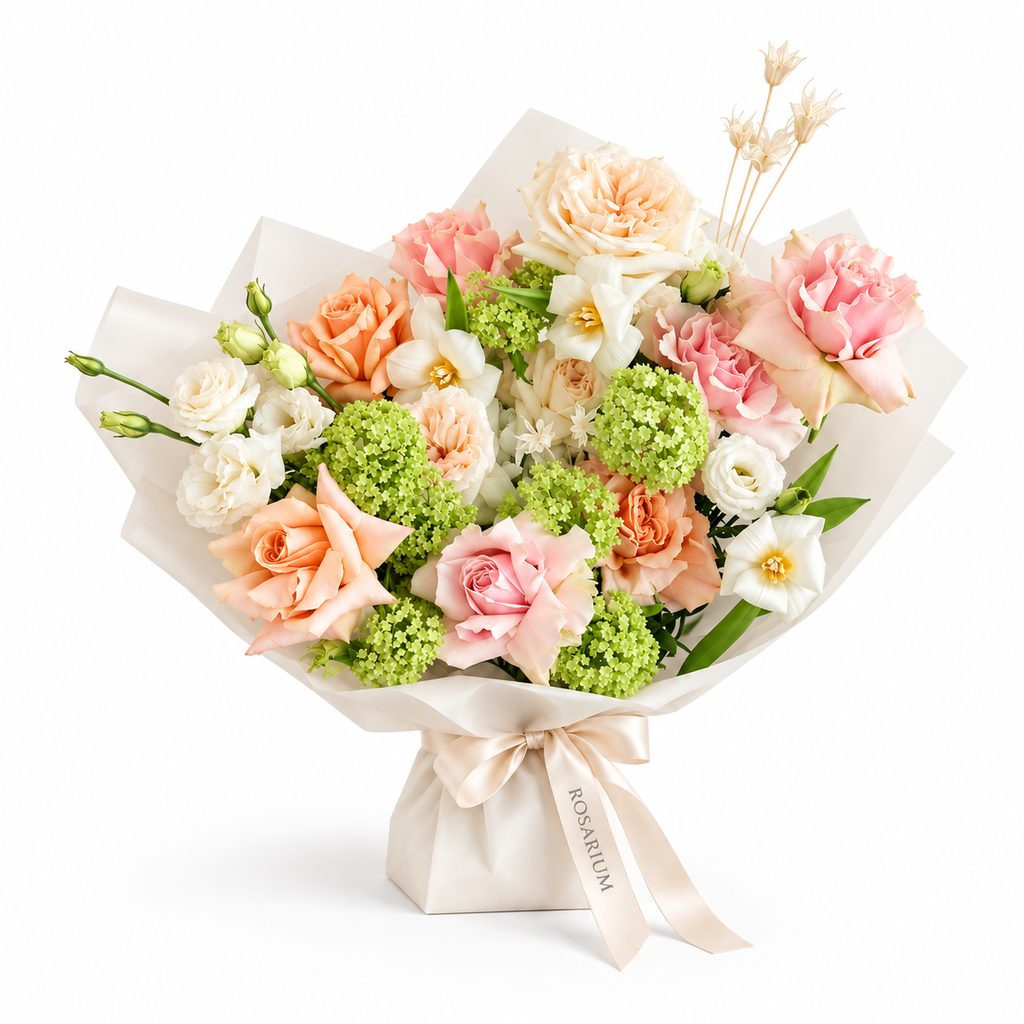 Spring Fling, peach, pink and white roses with small white blooms in off-white wrapping