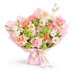 Spring Fling, peach, pink and white roses with small white blooms in light pink wrapping