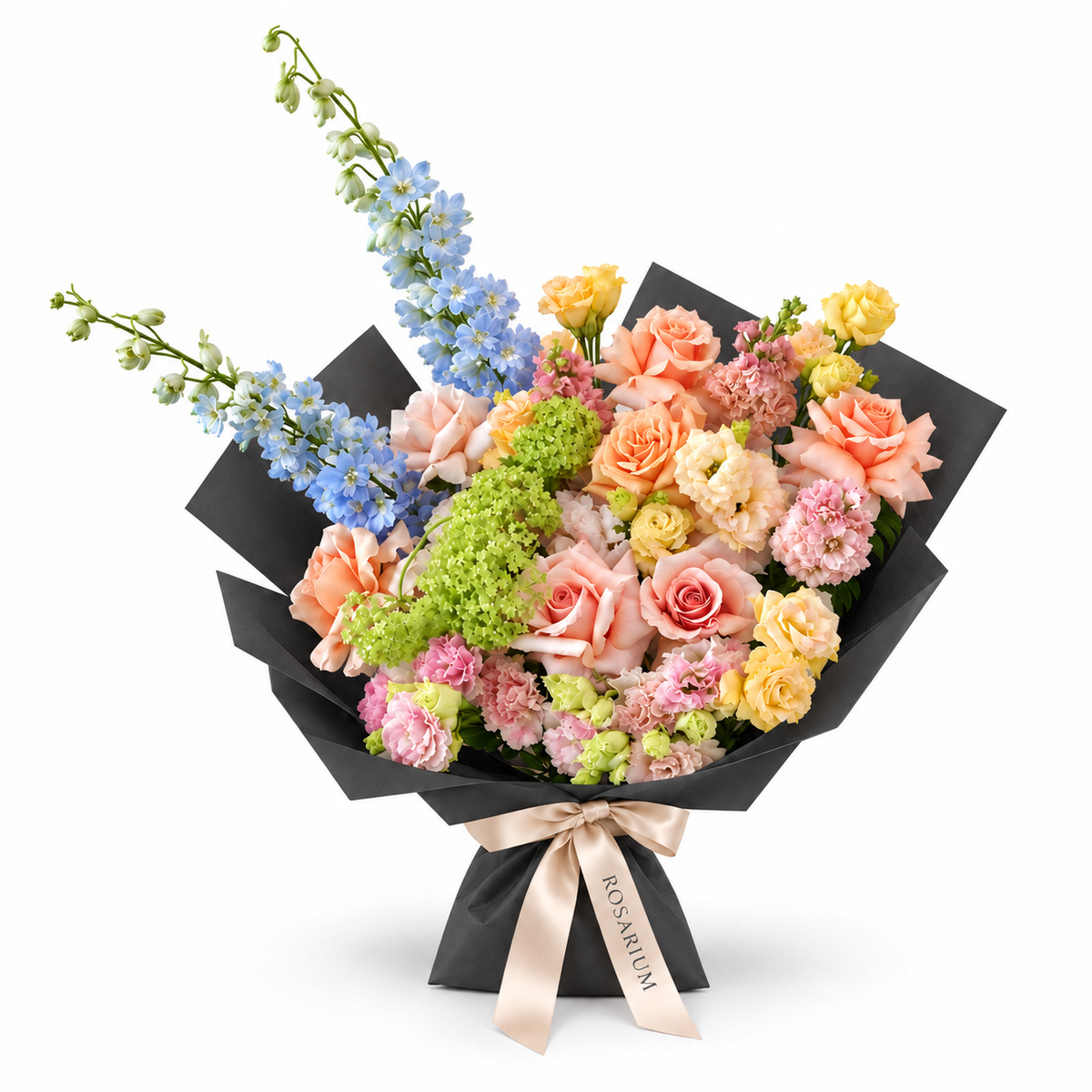 Spring with a Twist, blue delphinium, peach roses, yellow spray roses and blush carnations in black wrapping