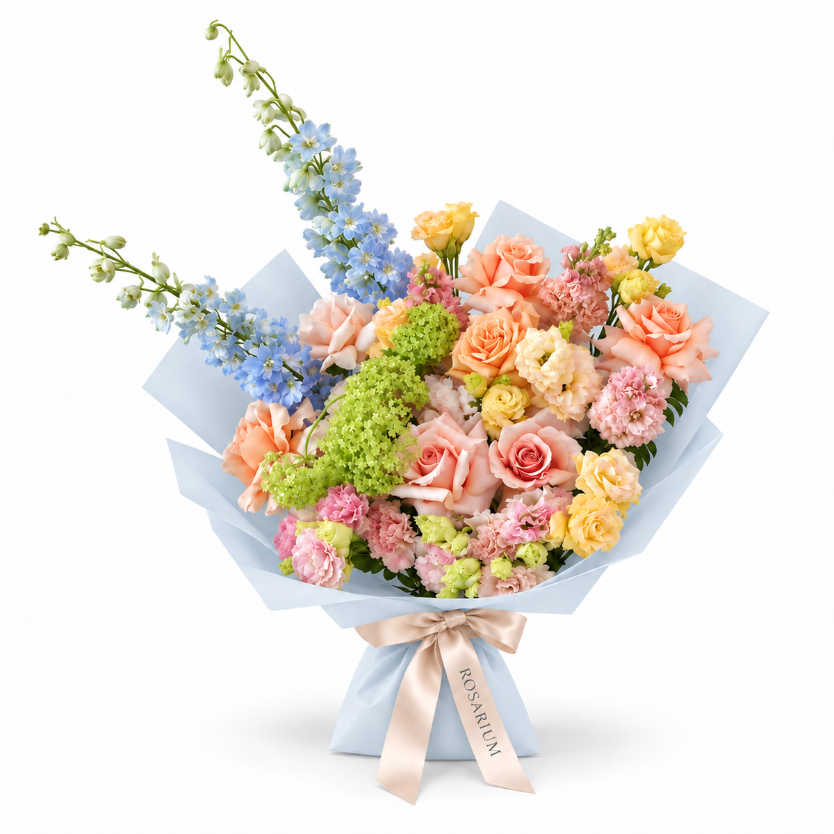 Spring with a Twist, blue delphinium, peach roses, yellow spray roses and blush carnations in blue wrapping