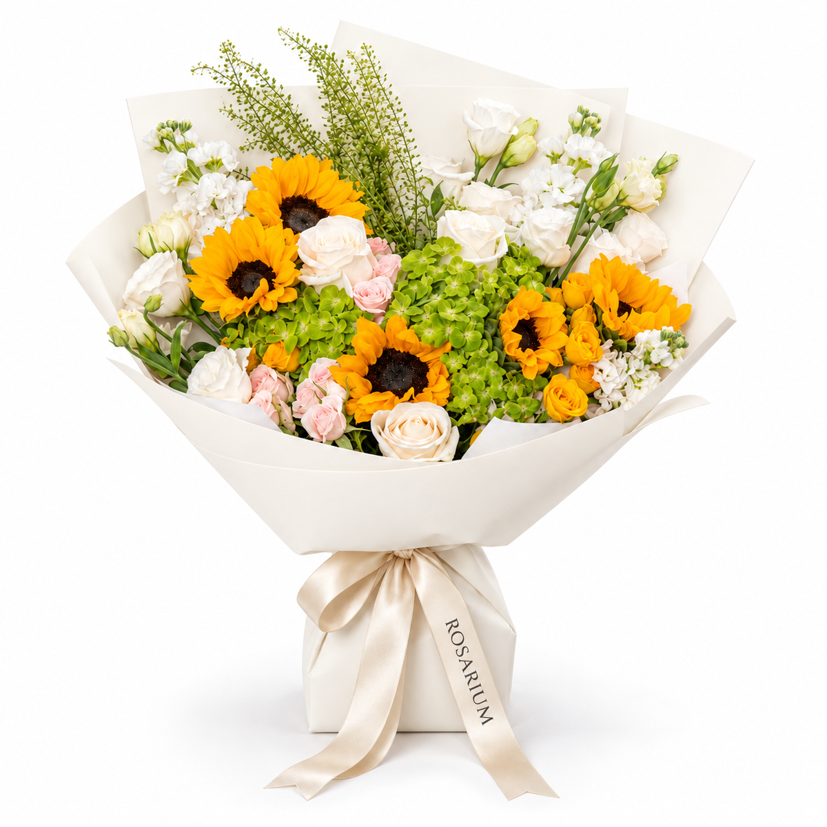Sunshine Chorus, sunflowers, green hydrangea, pink and yellow spray roses and white stock in off-white wrapping