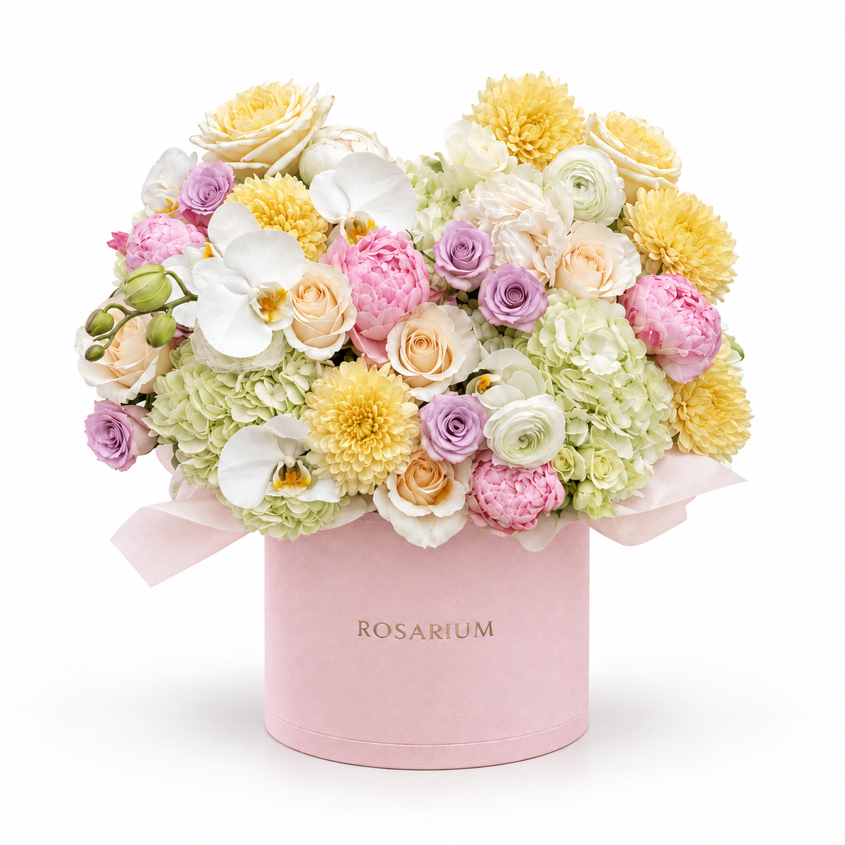 Pastel Mischief main view, cream hydrangea, white orchids, yellow chrysanthemums, lavender and cream roses, pale-pink carnations in a light pink Rosarium box