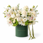 Ivory & Moss main view, ivory roses, white orchids, white chrysanthemums, cotton bolls and green hydrangea in a forest green Rosarium box