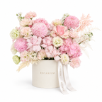Pink in Full Bloom main view, blush roses, pink disbud chrysanthemums, pink hydrangea and cream lisianthus in a off-white Rosarium box