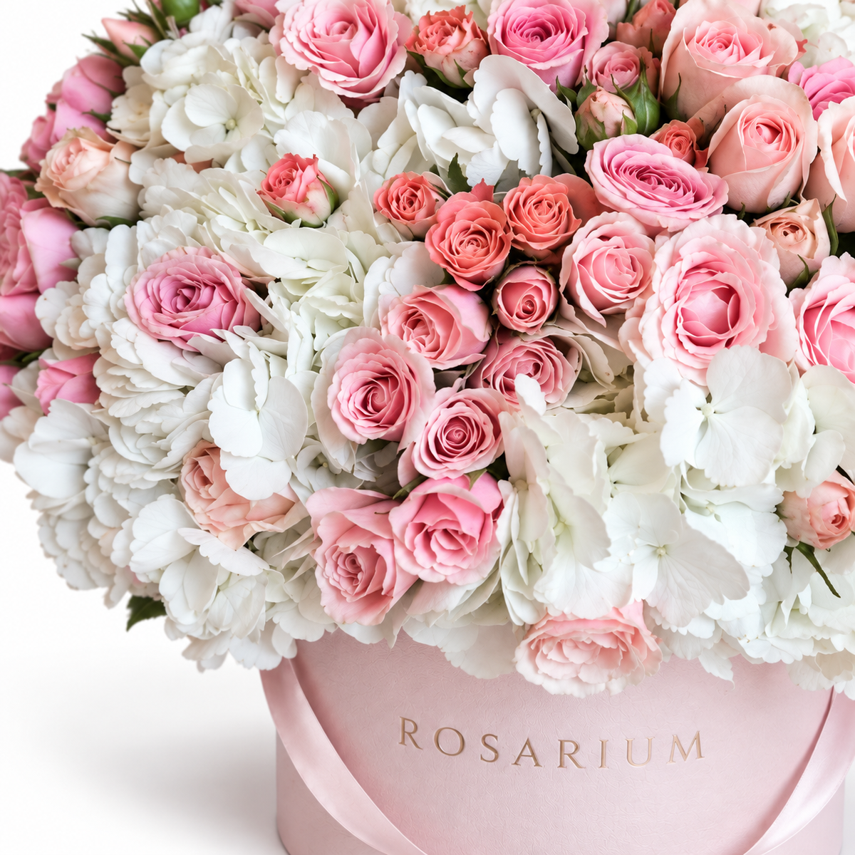 Heaven in Pink floral detail, pink roses, white hydrangea and pale-pink spray roses in a light pink Rosarium box