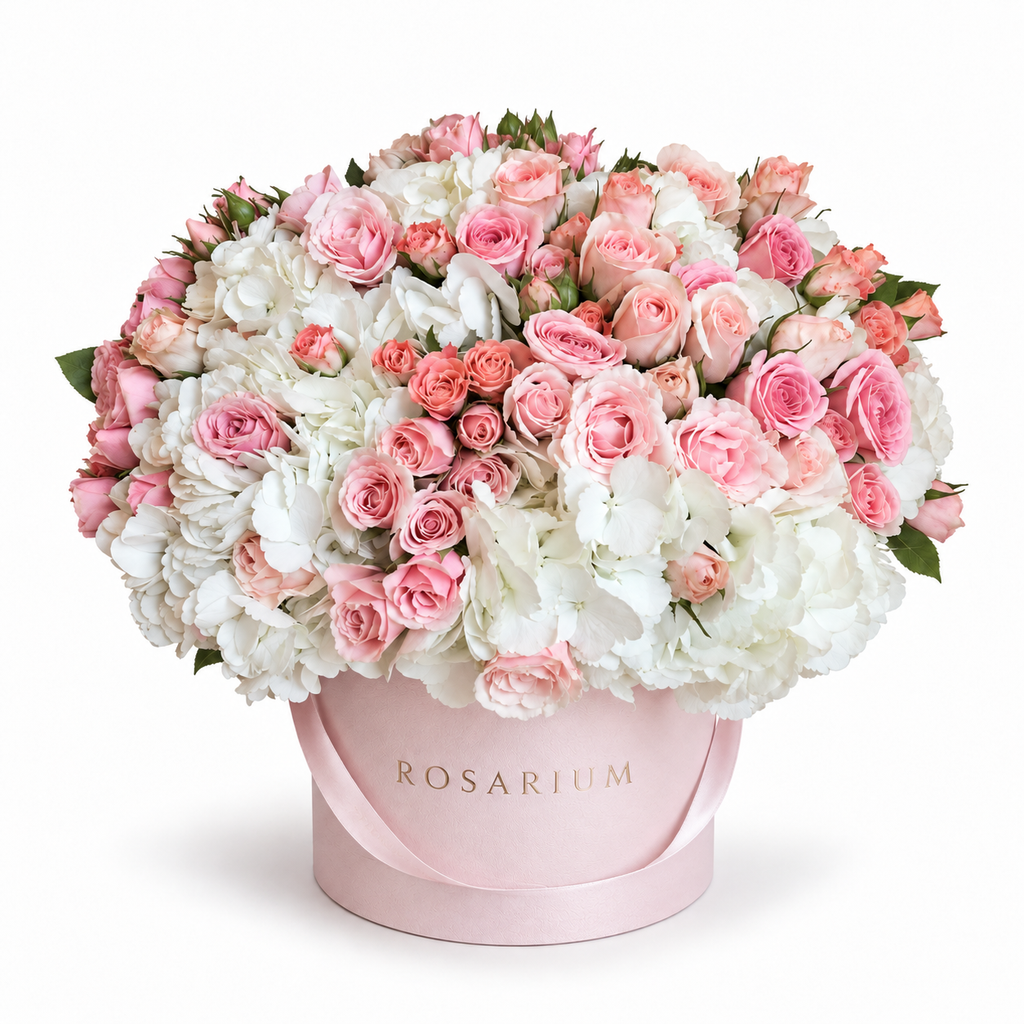 Heaven in Pink main view, pink roses, white hydrangea and pale-pink spray roses in a light pink Rosarium box