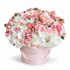 Heaven in Pink main view, pink roses, white hydrangea and pale-pink spray roses in a light pink Rosarium box