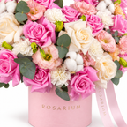 Soft-Hearted floral detail, pink and white roses, white carnations and pale-pink lisianthus in a light pink Rosarium box