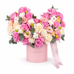 Soft-Hearted main view, pink and white roses, white carnations and pale-pink lisianthus in a light pink Rosarium box