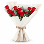 12 red roses in off-white wrapping with a Rosarium ribbon