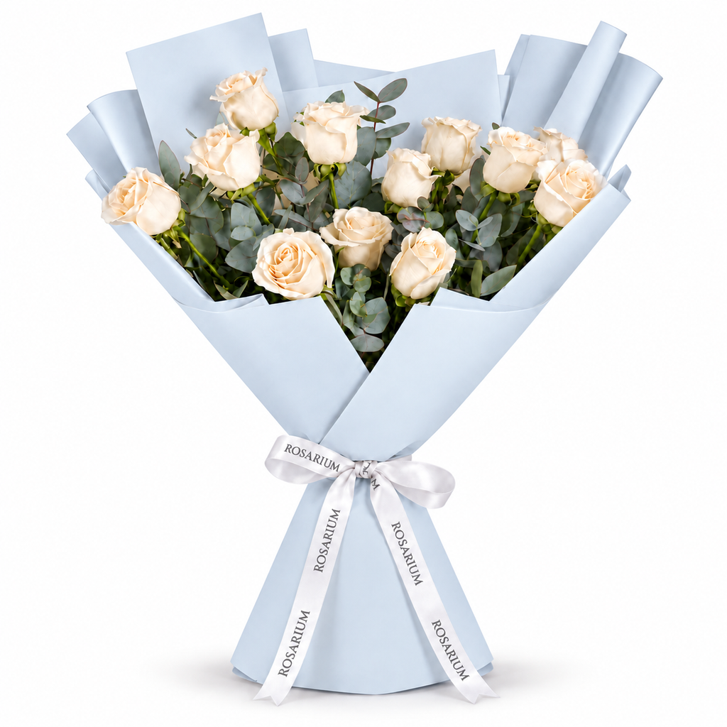 12 white roses in blue wrapping with a Rosarium ribbon