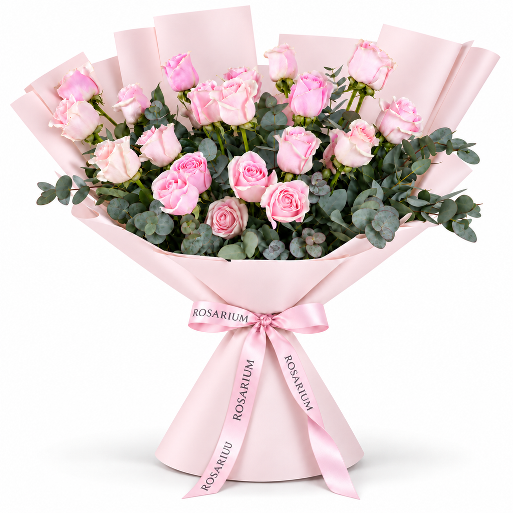 25 pink roses in light pink wrapping with a Rosarium ribbon
