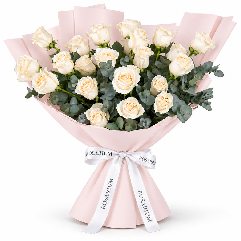 25 white roses in light pink wrapping with a Rosarium ribbon