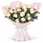 25 white roses in light pink wrapping with a Rosarium ribbon