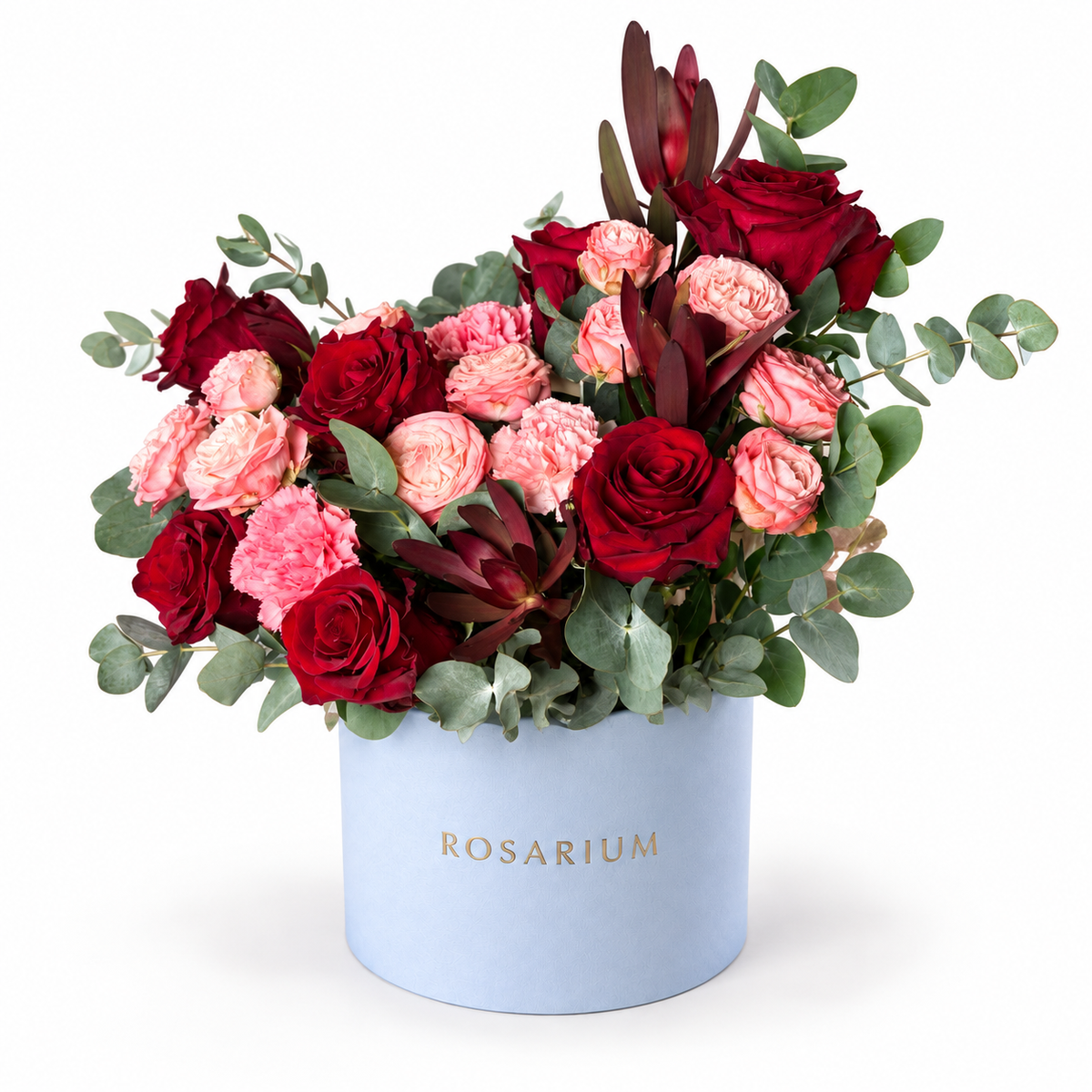 A Blush Love Note: red and pink roses with burgundy accents and eucalyptus in a blue Rosarium flower box