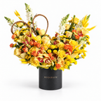 Apricot Afterglow: yellow and orange roses, yellow flowers and a woven heart in a black Rosarium flower box