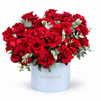 Be Mine, Loudly: red roses with eucalyptus in a blue Rosarium flower box