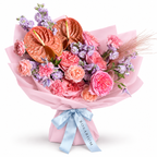 Blush After Dark: peach anthuriums, pink roses and lilac flowers in light pink wrapping