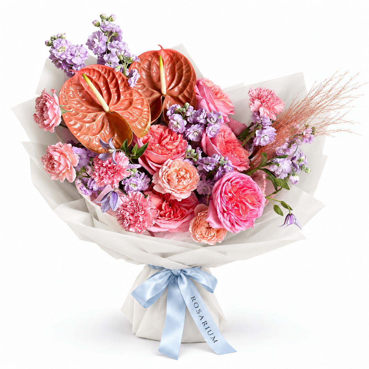 Blush After Dark: peach anthuriums, pink roses and lilac flowers in off-white wrapping