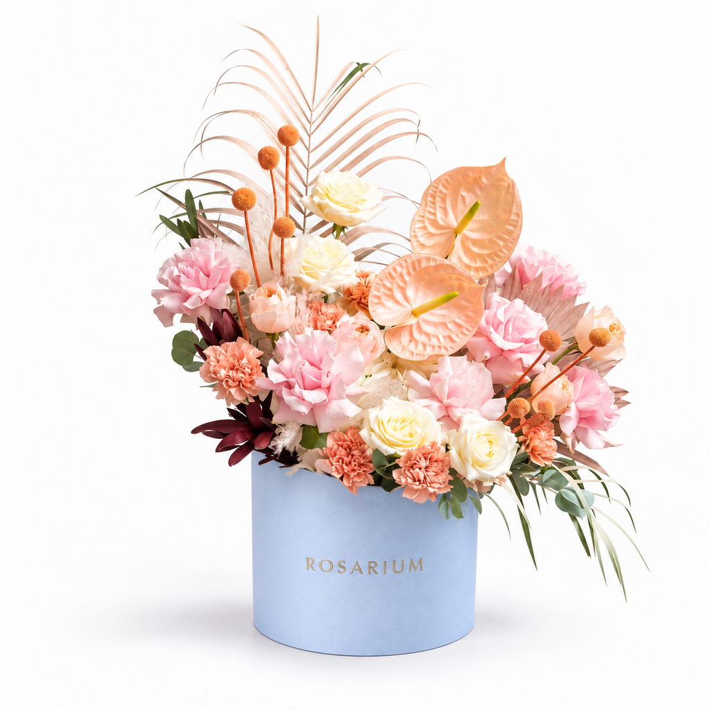 Blush, Interrupted: peach anthuriums, pink roses and small orange accents in a blue Rosarium flower box