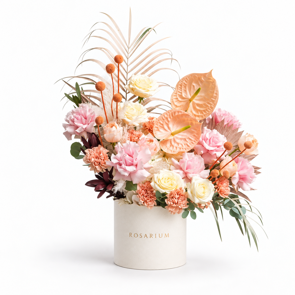 Blush, Interrupted: peach anthuriums, pink roses and small orange accents in an off-white Rosarium flower box
